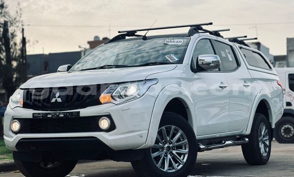 Buy Import Mitsubishi L200 White Car in Dakar in Dakar Buy Import Mitsubishi L200 White Car in Dakar in Dakar