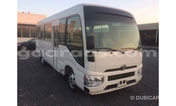 Buy Import Toyota Coaster White Car in Import - Dubai in Dakar Buy Import Toyota Coaster White Car in Import - Dubai in Dakar