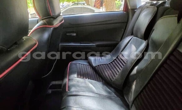 Dieundeu Occasion Mitsubishi RVR Red Auto in Dakar in Dakar Dieundeu Occasion Mitsubishi RVR Red Auto in Dakar in Dakar