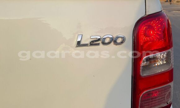 Buy Import Mitsubishi L200 White Car in Dakar in Dakar Buy Import Mitsubishi L200 White Car in Dakar in Dakar