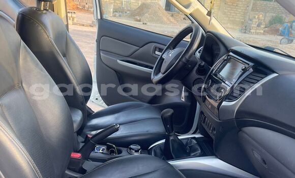 Buy Import Mitsubishi L200 White Car in Dakar in Dakar Buy Import Mitsubishi L200 White Car in Dakar in Dakar