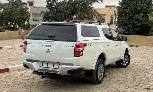 Buy Import Mitsubishi L200 White Car in Dakar in Dakar Buy Import Mitsubishi L200 White Car in Dakar in Dakar