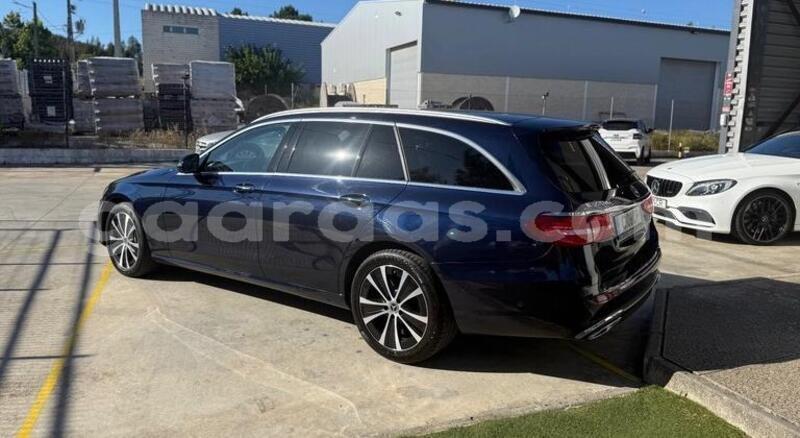 Big with watermark mercedes benz e class bagmati behind berlin 33783