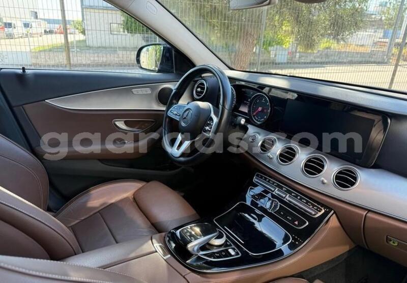 Big with watermark mercedes benz e class bagmati behind berlin 33783