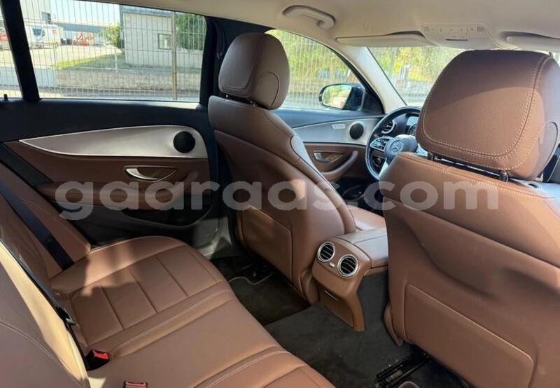 Big with watermark mercedes benz e class bagmati behind berlin 33783