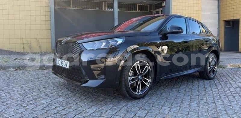 Big with watermark bmw ix bagmati behind berlin 34320