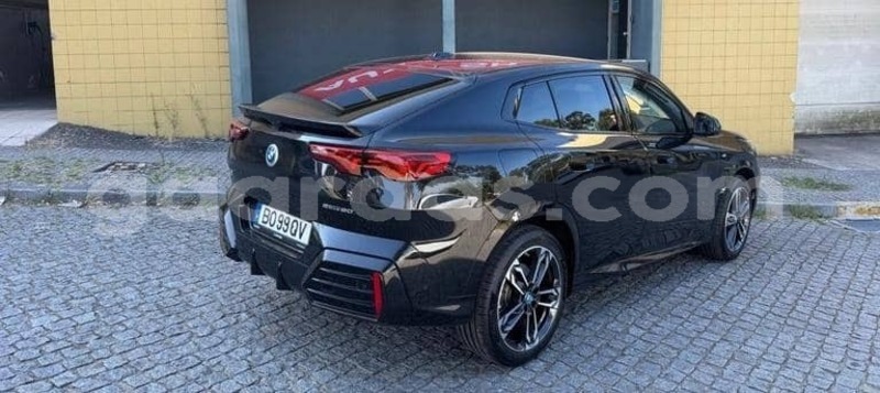 Big with watermark bmw ix bagmati behind berlin 34320