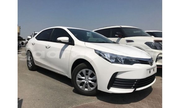 Buy Import Toyota Corolla White Car in Import - Dubai in Dakar Buy Import Toyota Corolla White Car in Import - Dubai in Dakar