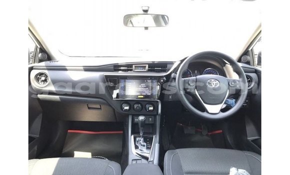 Buy Import Toyota Corolla White Car in Import - Dubai in Dakar Buy Import Toyota Corolla White Car in Import - Dubai in Dakar