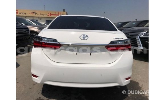 Buy Import Toyota Corolla White Car in Import - Dubai in Dakar Buy Import Toyota Corolla White Car in Import - Dubai in Dakar