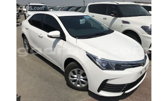 Buy Import Toyota Corolla White Car in Import - Dubai in Dakar Buy Import Toyota Corolla White Car in Import - Dubai in Dakar