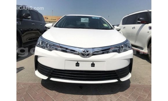 Buy Import Toyota Corolla White Car in Import - Dubai in Dakar Buy Import Toyota Corolla White Car in Import - Dubai in Dakar