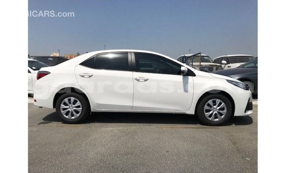 Buy Import Toyota Corolla White Car in Import - Dubai in Dakar Buy Import Toyota Corolla White Car in Import - Dubai in Dakar