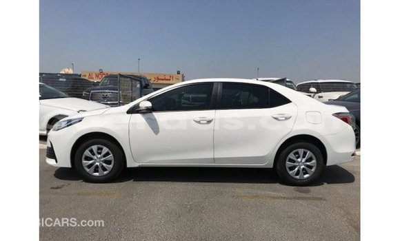 Buy Import Toyota Corolla White Car in Import - Dubai in Dakar Buy Import Toyota Corolla White Car in Import - Dubai in Dakar
