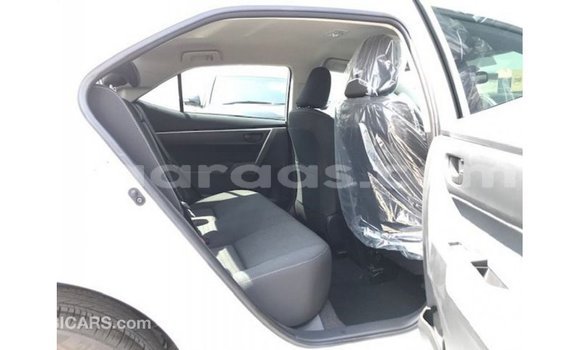 Buy Import Toyota Corolla White Car in Import - Dubai in Dakar Buy Import Toyota Corolla White Car in Import - Dubai in Dakar