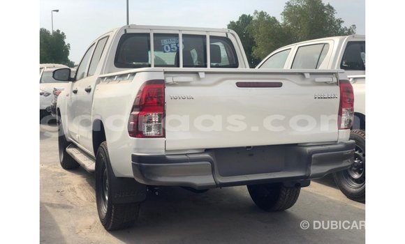 Buy Import Toyota Hilux White Car in Import - Dubai in Dakar Buy Import Toyota Hilux White Car in Import - Dubai in Dakar