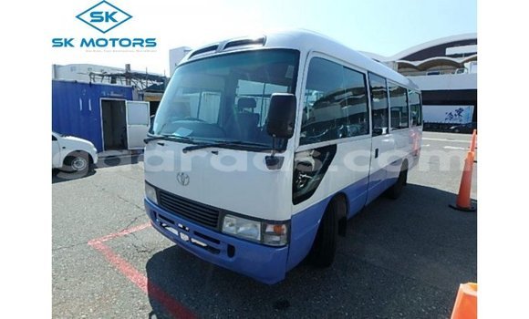 Acheter Import Voiture Toyota Coaster Blanc à Import - Dubai, Dakar