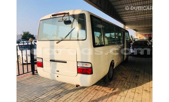 Buy Import Toyota Coaster White Car in Import - Dubai in Dakar Buy Import Toyota Coaster White Car in Import - Dubai in Dakar