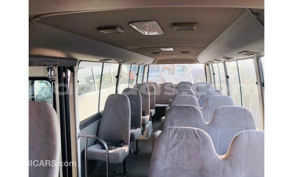 Buy Import Toyota Coaster White Car in Import - Dubai in Dakar Buy Import Toyota Coaster White Car in Import - Dubai in Dakar