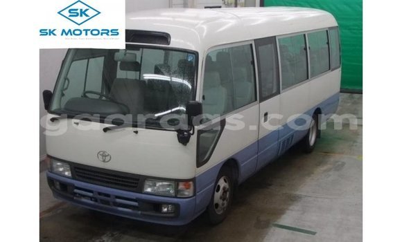 Acheter Import Voiture Toyota Coaster Blanc à Import - Dubai, Dakar