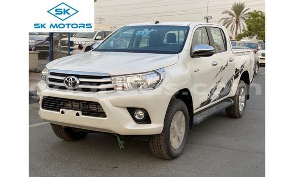 Buy Import Toyota Hilux White Car in Import - Dubai in Dakar