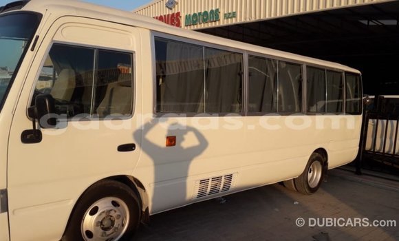 Buy Import Toyota Coaster White Car in Import - Dubai in Dakar Buy Import Toyota Coaster White Car in Import - Dubai in Dakar