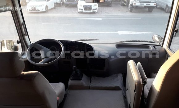 Buy Import Toyota Coaster White Car in Import - Dubai in Dakar Buy Import Toyota Coaster White Car in Import - Dubai in Dakar