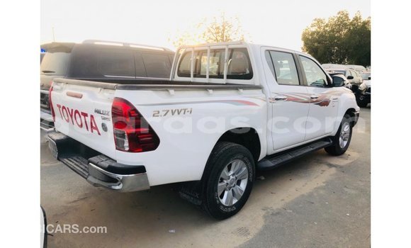 Buy Import Toyota Hilux White Car in Import - Dubai in Dakar Buy Import Toyota Hilux White Car in Import - Dubai in Dakar