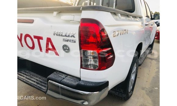 Buy Import Toyota Hilux White Car in Import - Dubai in Dakar Buy Import Toyota Hilux White Car in Import - Dubai in Dakar