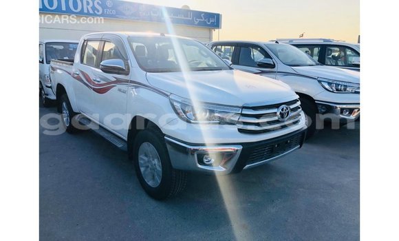 Buy Import Toyota Hilux White Car in Import - Dubai in Dakar Buy Import Toyota Hilux White Car in Import - Dubai in Dakar